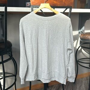 Stars above light gray sweatshirt